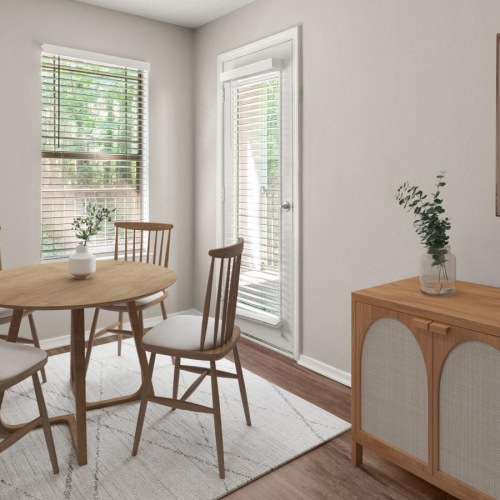 Wide open living areas flooded with natural light a dining room with a table and chairs