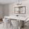 a dining room with a table and chairs