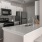a kitchen with white cabinets