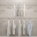 closet with shirts hanging and several shelves